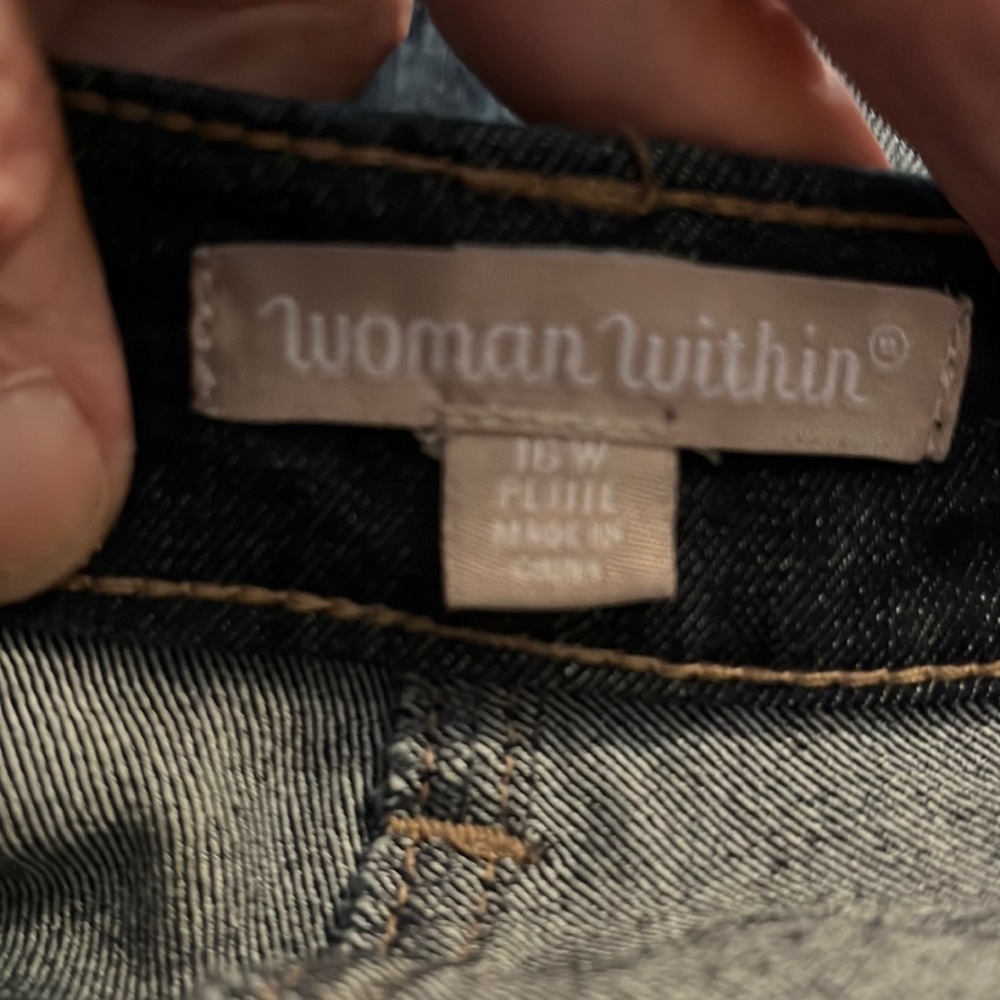 One pair of blue jeans new without tags was tried on once